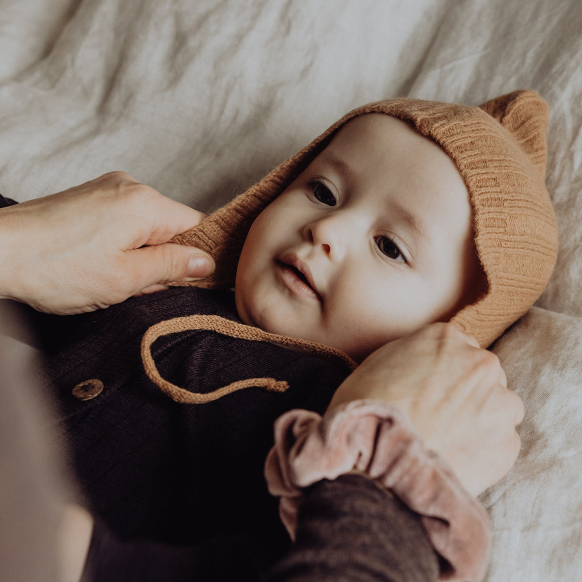 Finch and Fable kids Wool Knitted Bonnet - Fawn - on baby