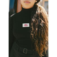 AT25122A Clubhouse Black Ribbed Turtleneck With Logo On Chest