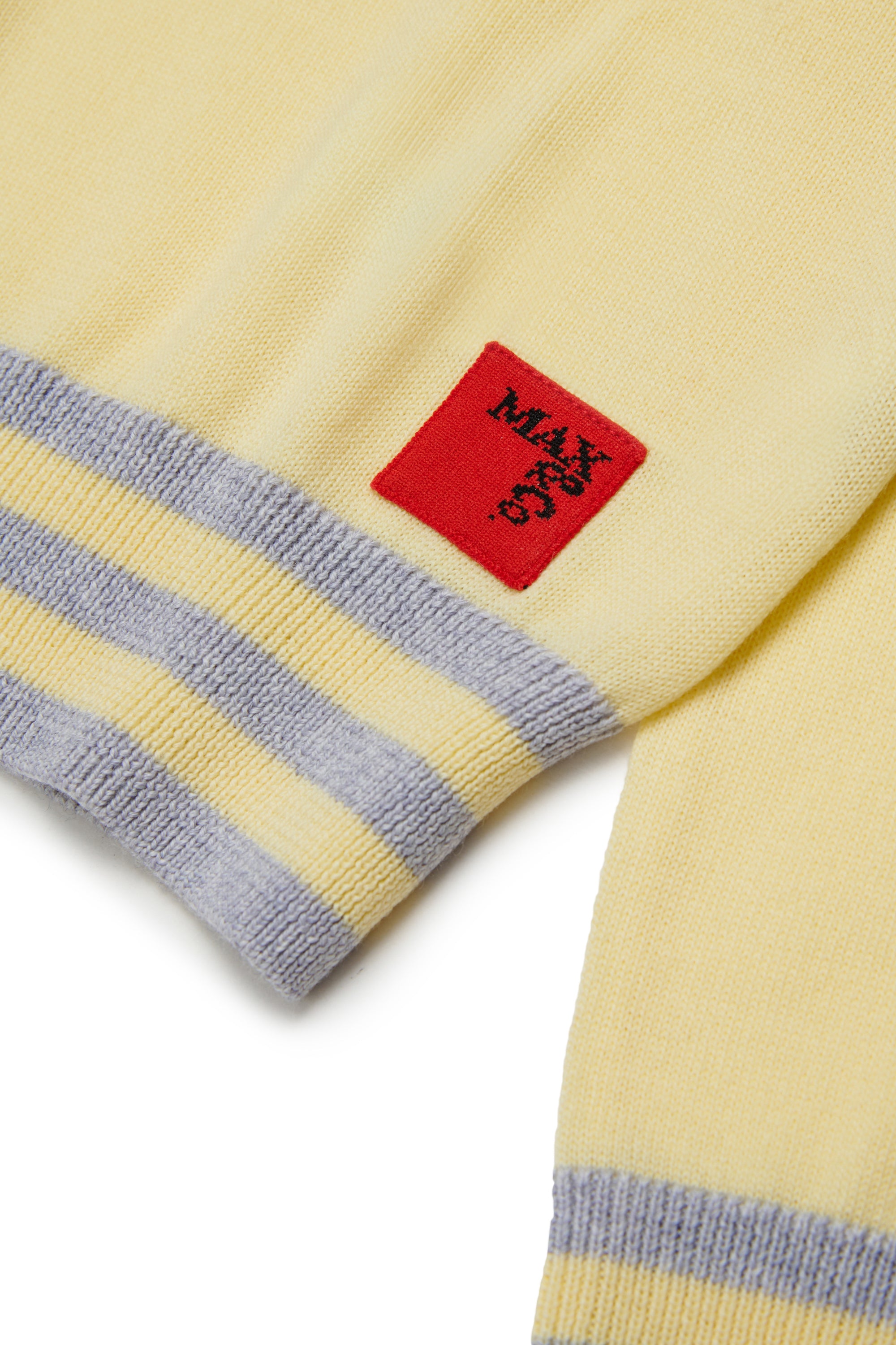 KNIT SWEATER WITH STRIPES AROUND THE EDGES