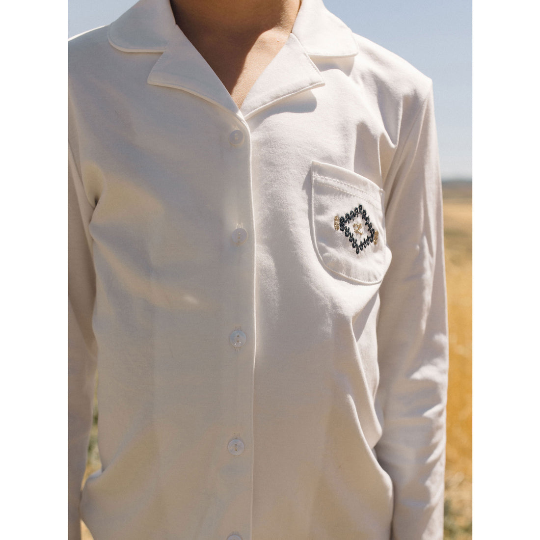 LBL50 Ladida White Boys Shirt With L Graphics On Pocket